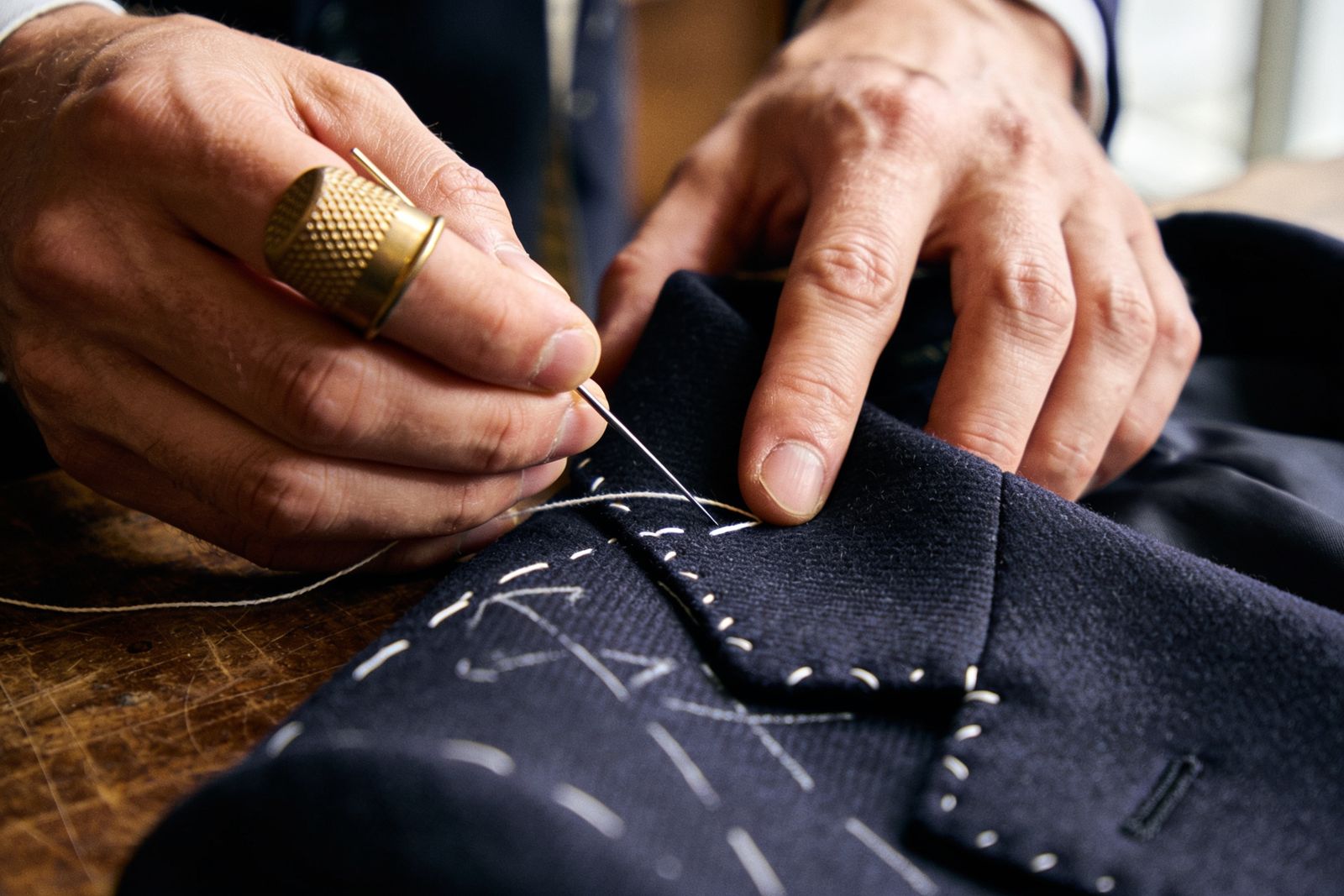 Hand-stitching a lapel