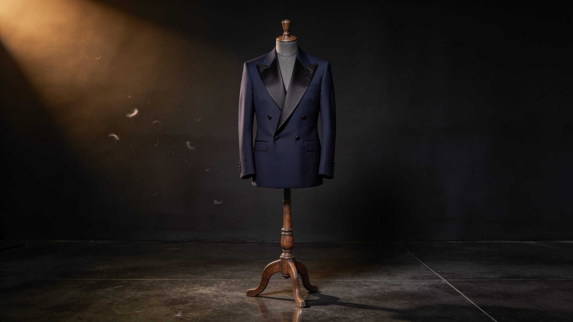 Navy bespoke suit on a tailor's dress form